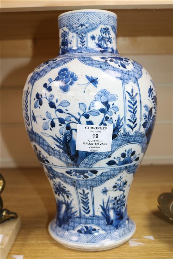 A Chinese blue and white baluster vase 30cm.